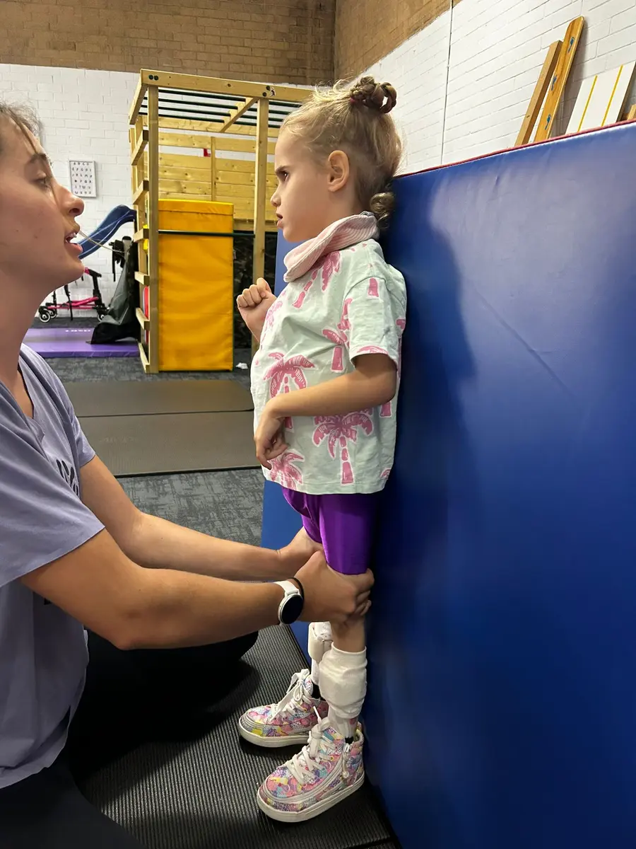A young Australian child with CDKL5 deficiency disorder during a physiotherapy session